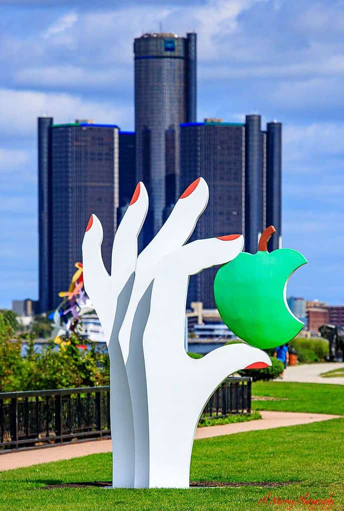 Windsor's riverside Sculpture Garden looking towards Detroit skyline. Walking activity in Windsor