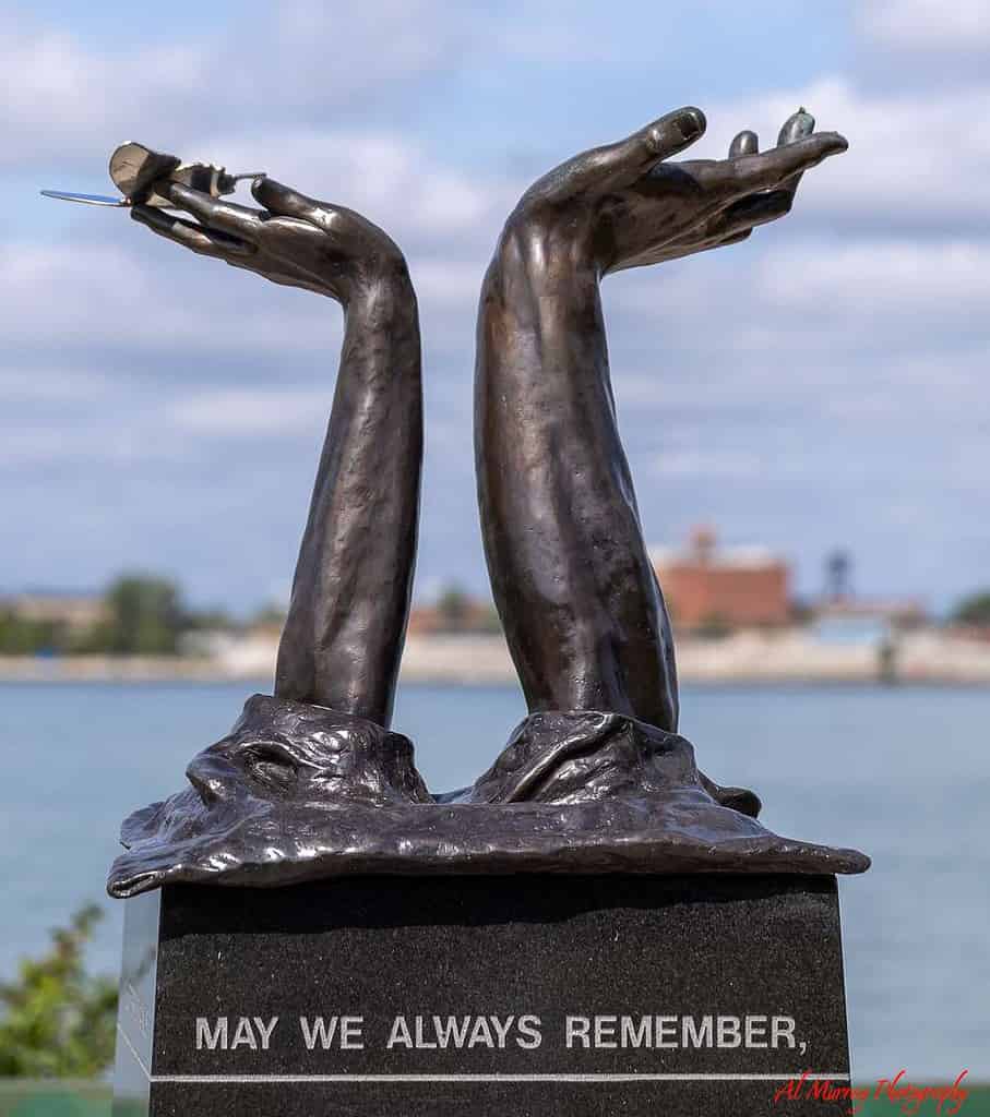 Walking along the Detroit river in Windsor's riverside Sculpture Garden - activities in Windsor Essex