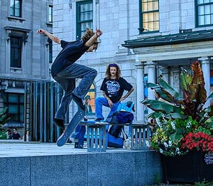 Walking About Old Montreal and Exploring; Skate boarders performing