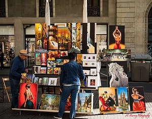 La Rambla Barcelona with many art markets, flower vendors, restaurants is a great place to visit