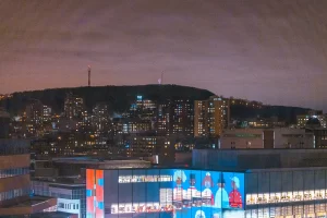 On this particular NYE, I was looking out from my hotel room down with the flu. Admiring the night's lights over Mount Royal answered the question is Montreal a good place to celebrate nye