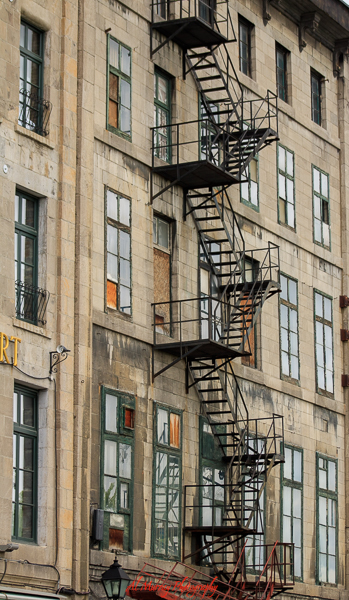 In Montreal, one unique architectural feature you will notice is the external staircase and fire escapes.  Why?  visit Montreal to find out!
