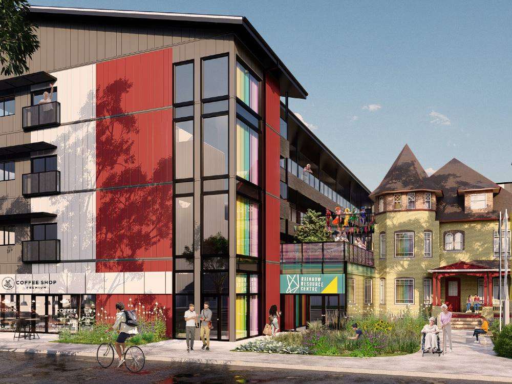 Modern apartment building and historic house side by side, with signs for a coffee shop and the Rainbow Resource Centre, a community hub for LGBTQ+ individuals. This inclusive space reflects the kind of welcoming environment where LGBTQ seniors can find connection and support on Valentine’s Day.
