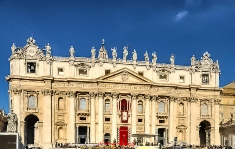 St Peter’s Basilica stands in bright sunlight beneath a deep blue sky, with its grand columns, statues, and ornate façade stretching across the frame. The scale and historic beauty of this iconic landmark showcase the unforgettable cultural stops that often become highlights in a transatlantic cruise review.